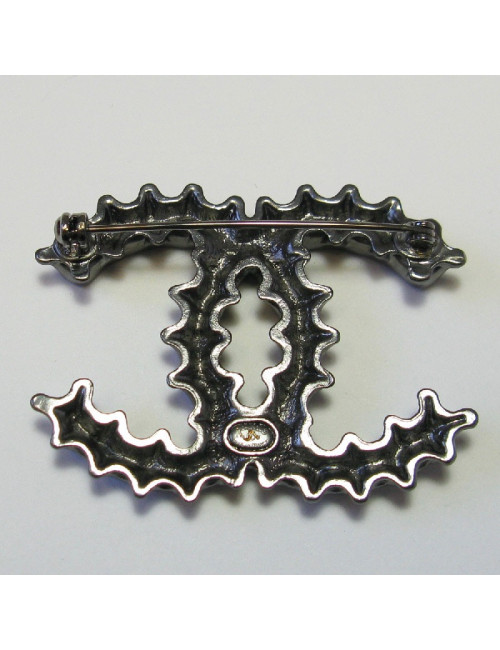 CHANEL CC bottle cap brooch in ruthenium