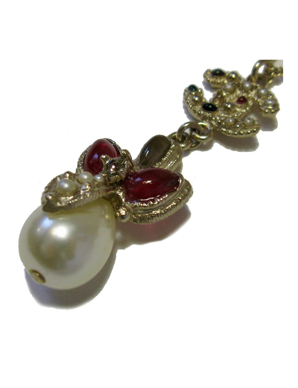 CHANEL pendant necklace in gilded metal and molten glass