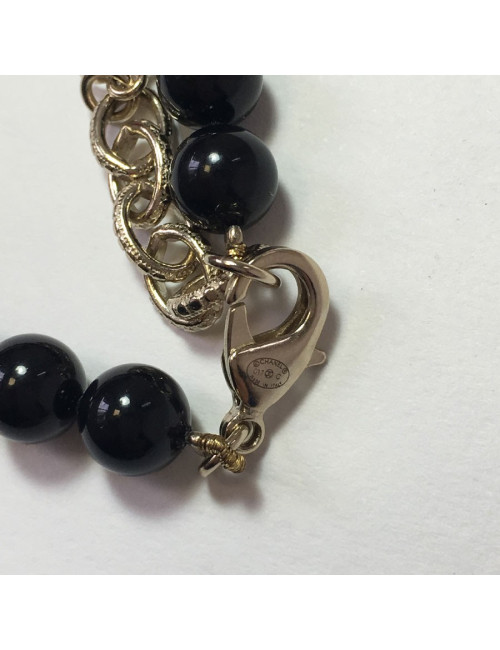 Sautoir CHANEL perles noires et CC dorés