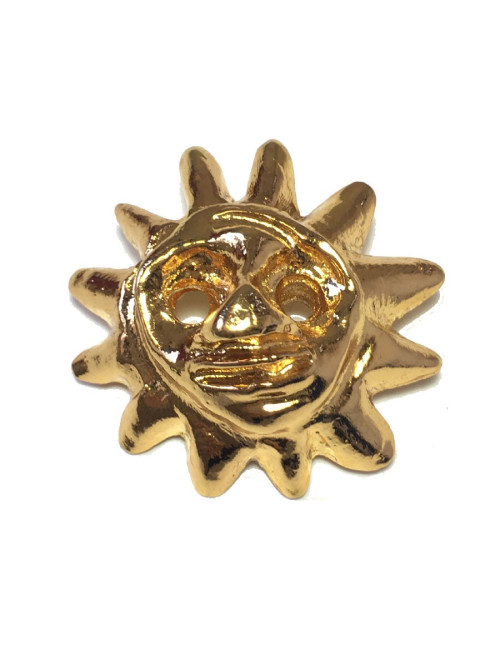 Broche CHRISTIAN LACROIX soleil vintage en résine dorée
