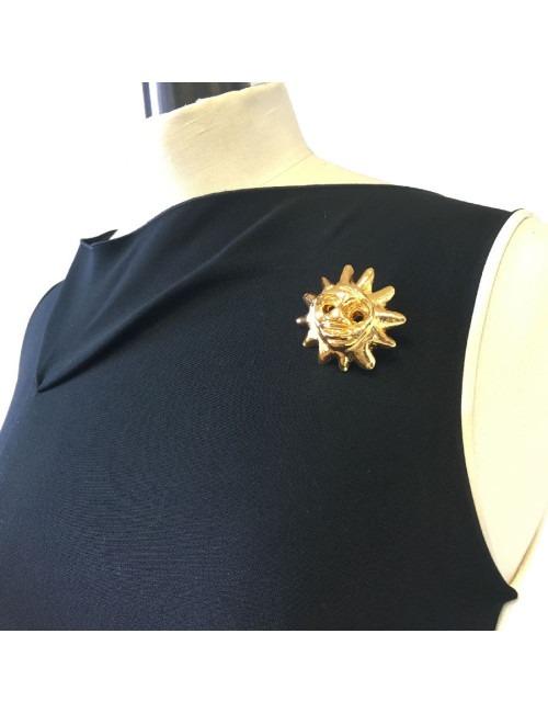 Broche CHRISTIAN LACROIX soleil vintage en résine dorée