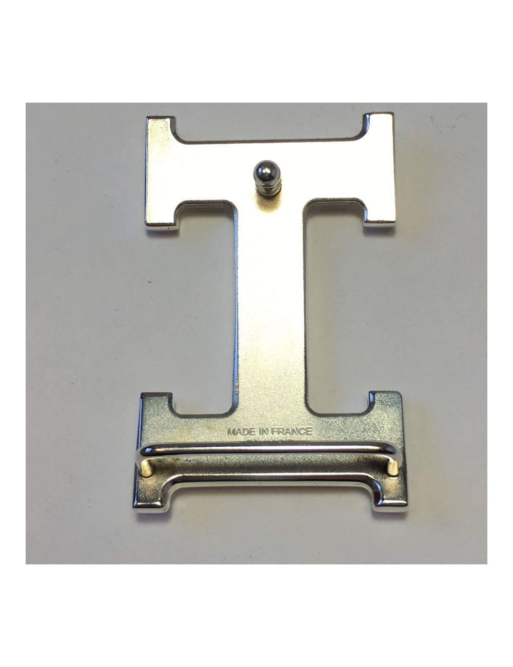 Boucle H HERMÈS métal palladié