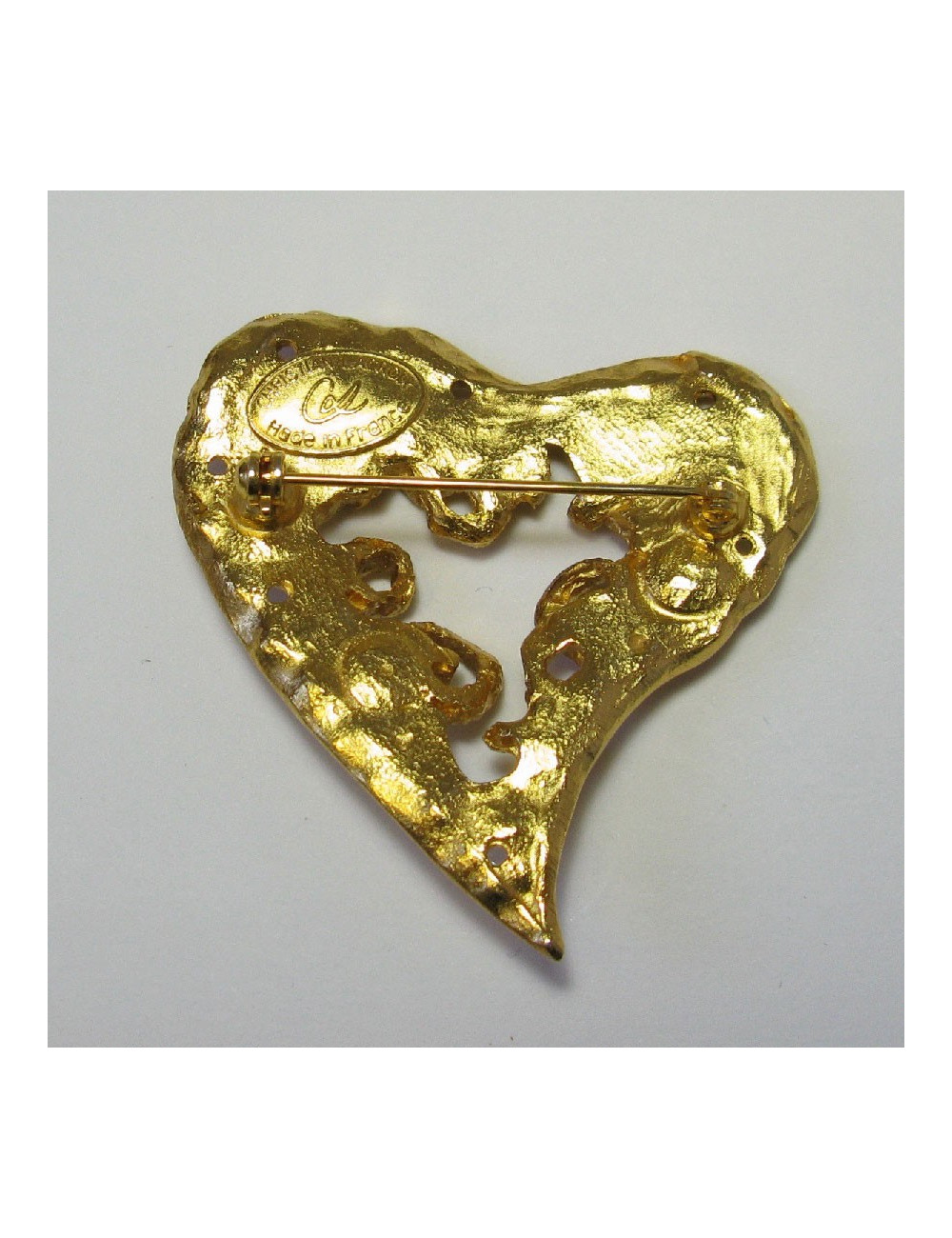 CHRISTIAN LACROIX heart brooch in gilt metal and rhinestones