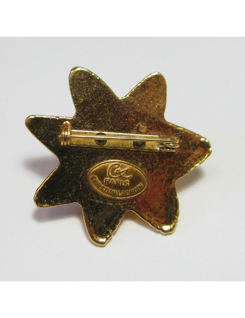 Broche CHRISTIAN LACROIX soleil en résine dorée vintage