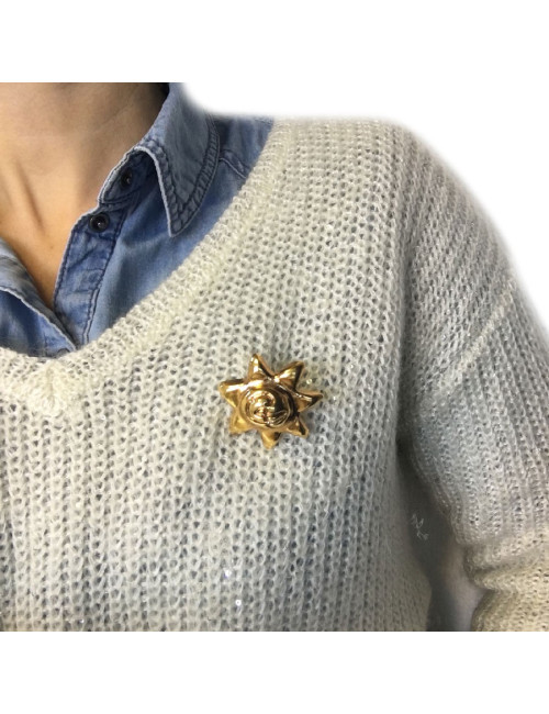 Broche CHRISTIAN LACROIX soleil en résine dorée vintage