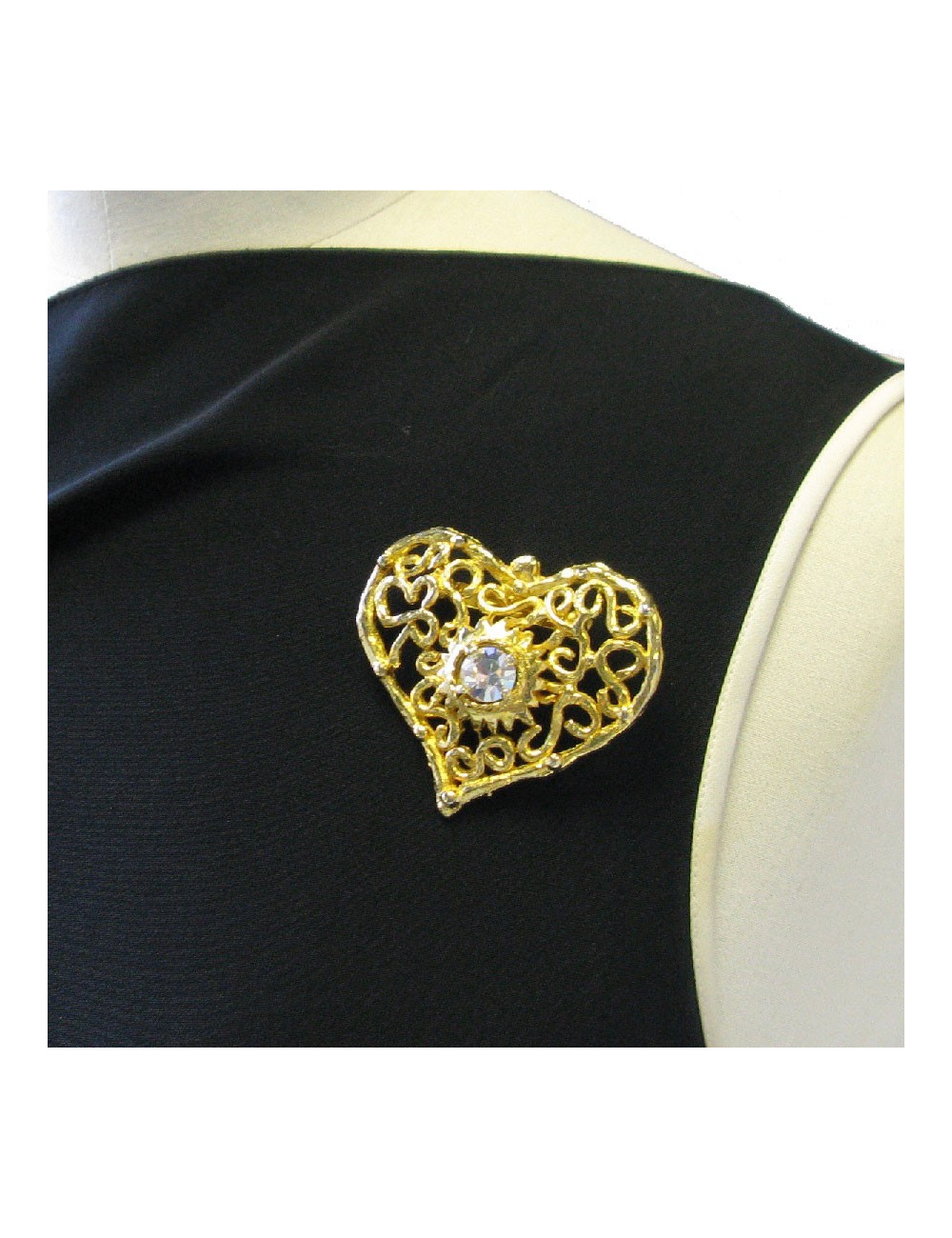 CHRISTIAN LACROIX heart brooch in gilded metal and white rhinestone