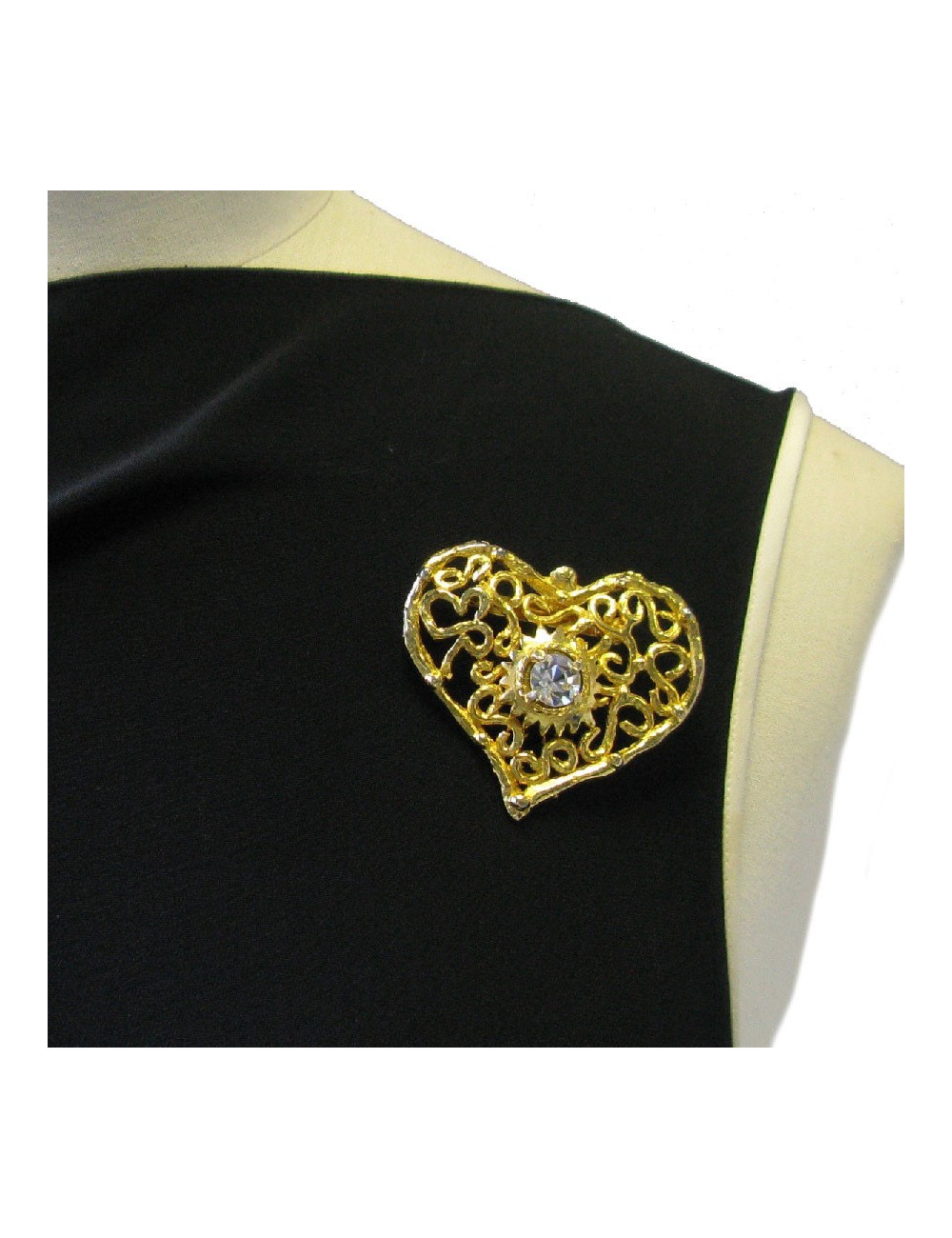 Broche CHRISTIAN LACROIX vintage coeur en métal doré serti d'un grand strass blanc au centre