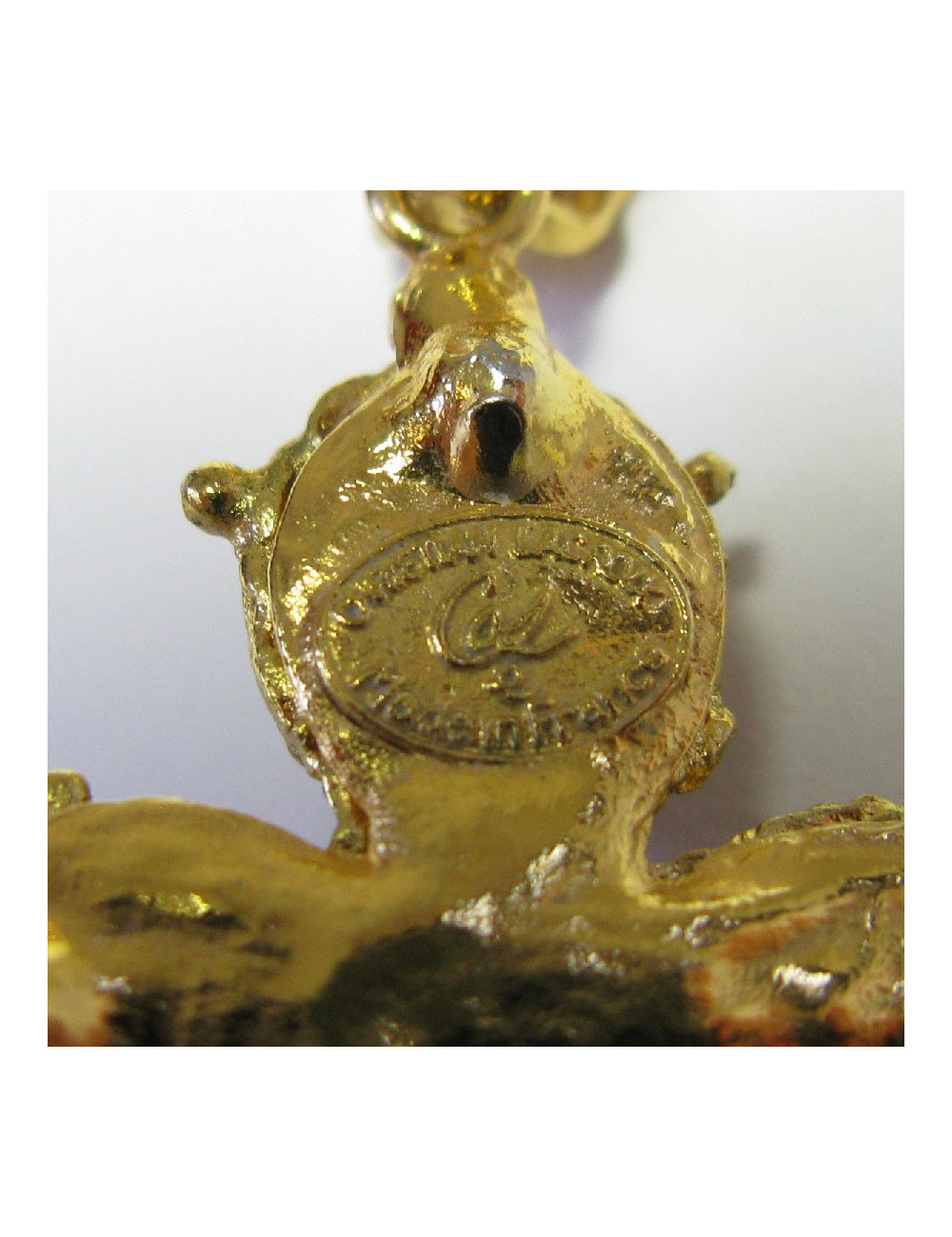 Pendentif CHRISTIAN LACROIX doré