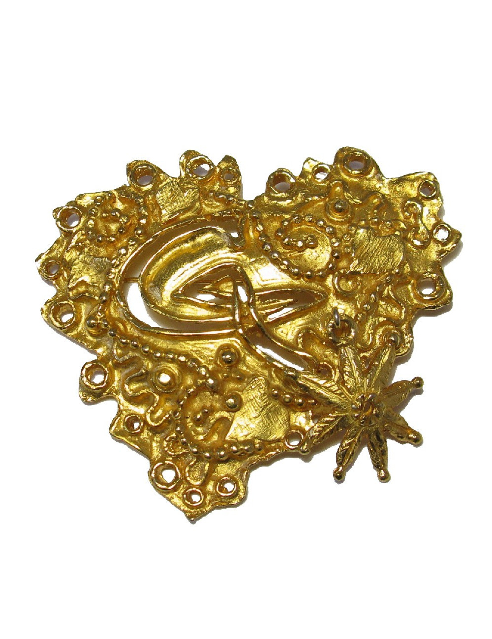 Broche CHRISTIAN LACROIX en métal doré