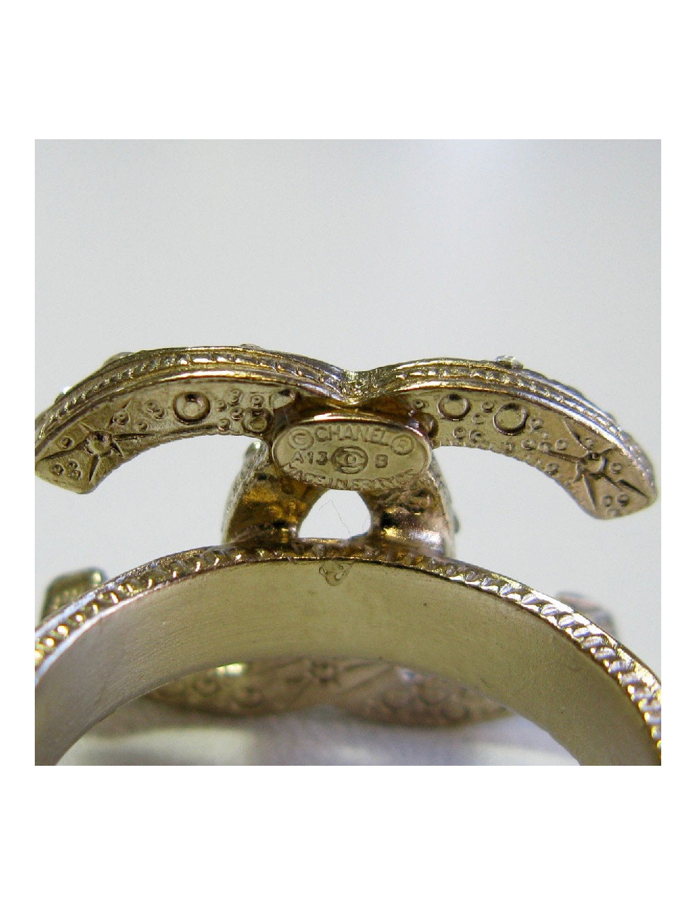 Bague CHANEL CC T52 en métal doré or pâle et strass