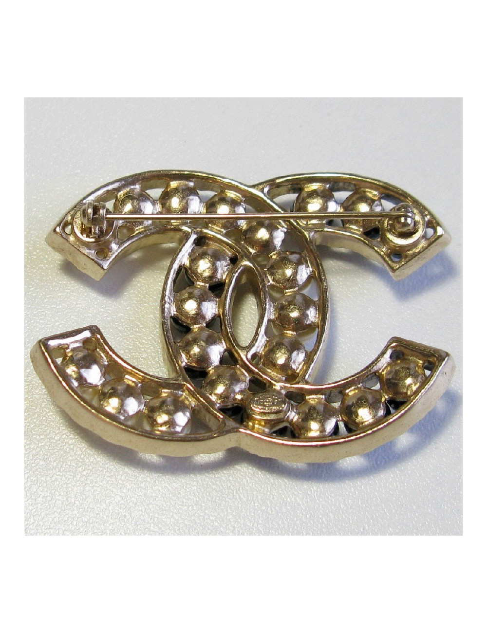 Broche CHANEL perles nacrées et noires