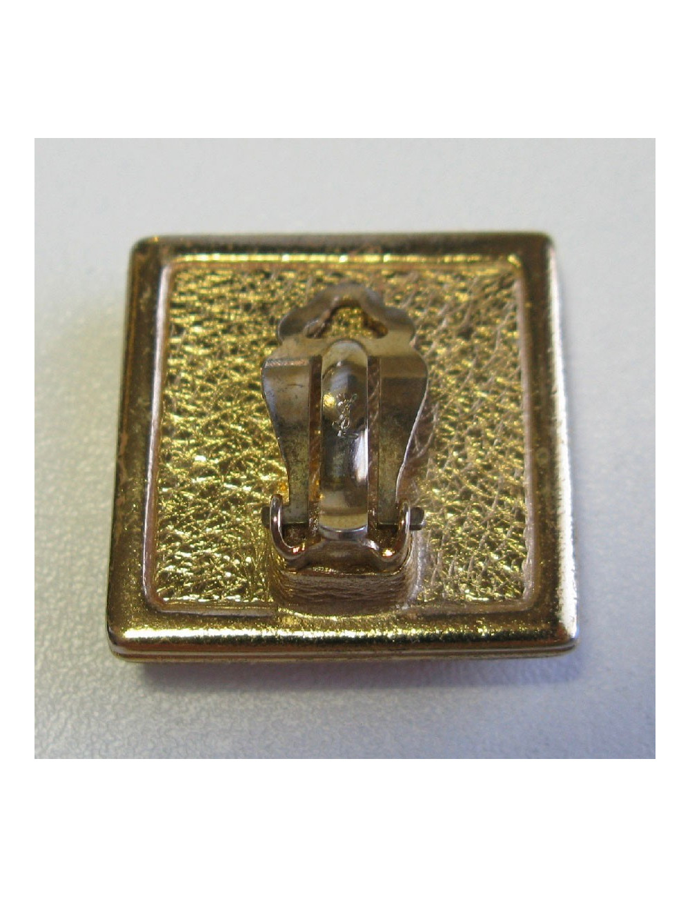 YSL SAINT LAURENT clip-on earrings in gilded metal and amber fantasy stone