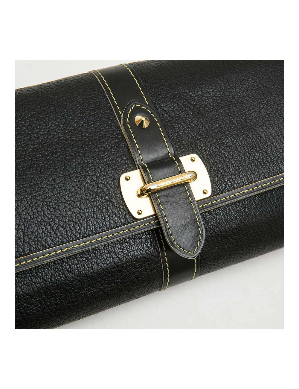 LOUIS VUITTON clutch in black grained leather with saddle stitching