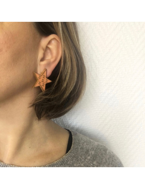 Boucles d'oreilles clips CHANEL "étoile" corail