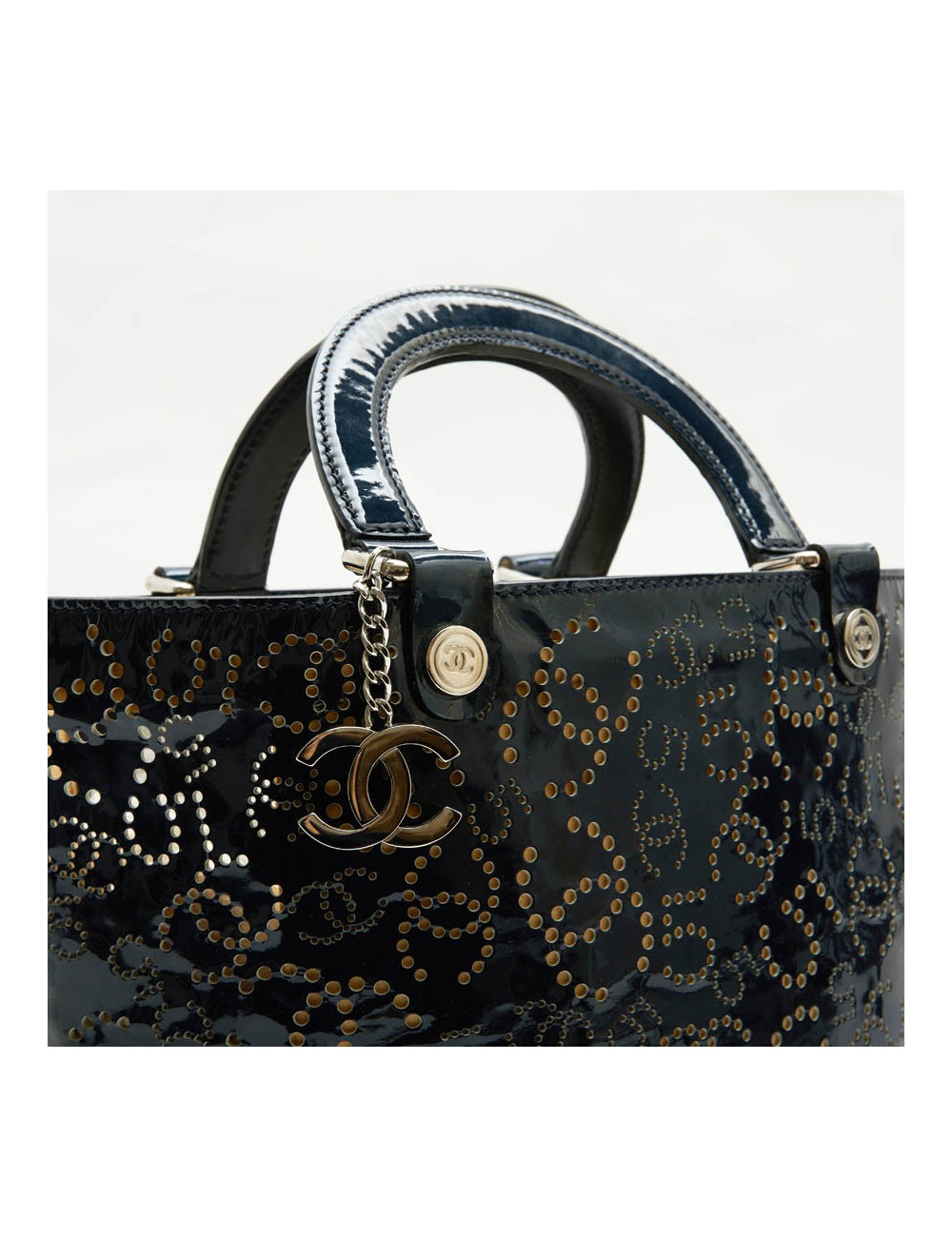 CHANEL bag in perforated navy blue patent leather