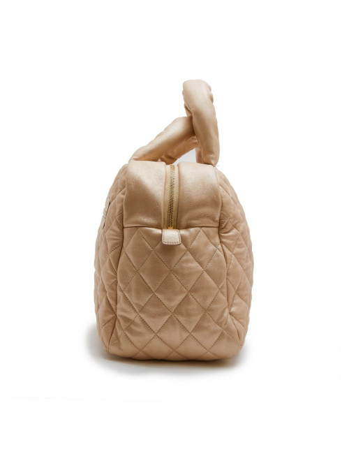 CHANEL 'Cocoon' bag in gold quilted leather