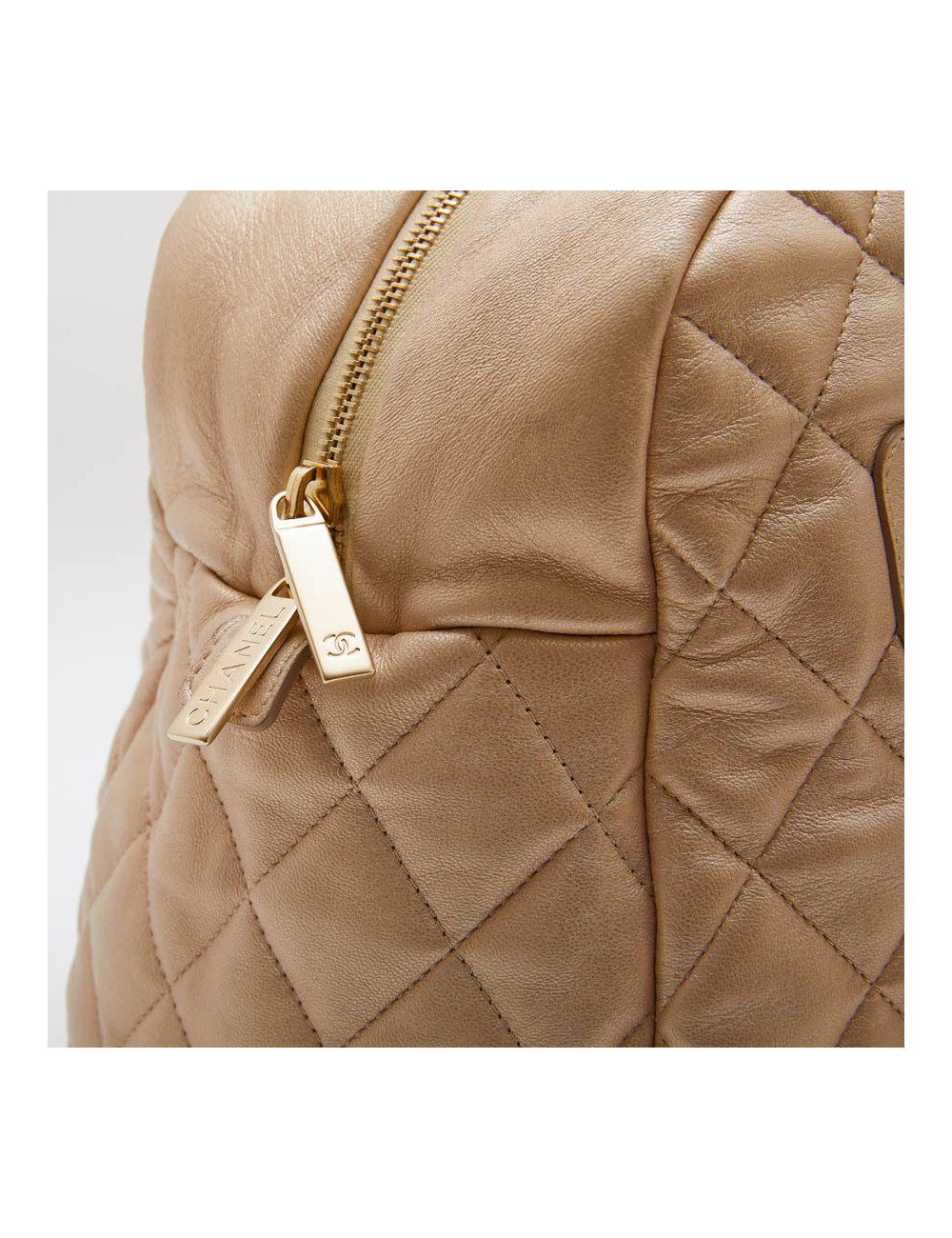  CHANEL 'Cocoon' bag in gold quilted leather