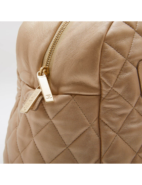  CHANEL 'Cocoon' bag in gold quilted leather