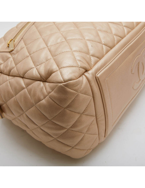  CHANEL 'Cocoon' bag in gold quilted leather