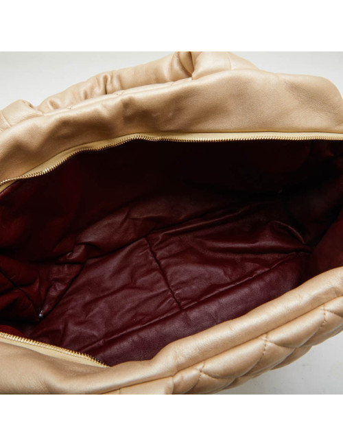  CHANEL 'Cocoon' bag in gold quilted leather