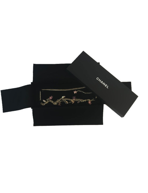 CHANEL "Paris-Shanghai"long necklace belt in gilt metal and charms