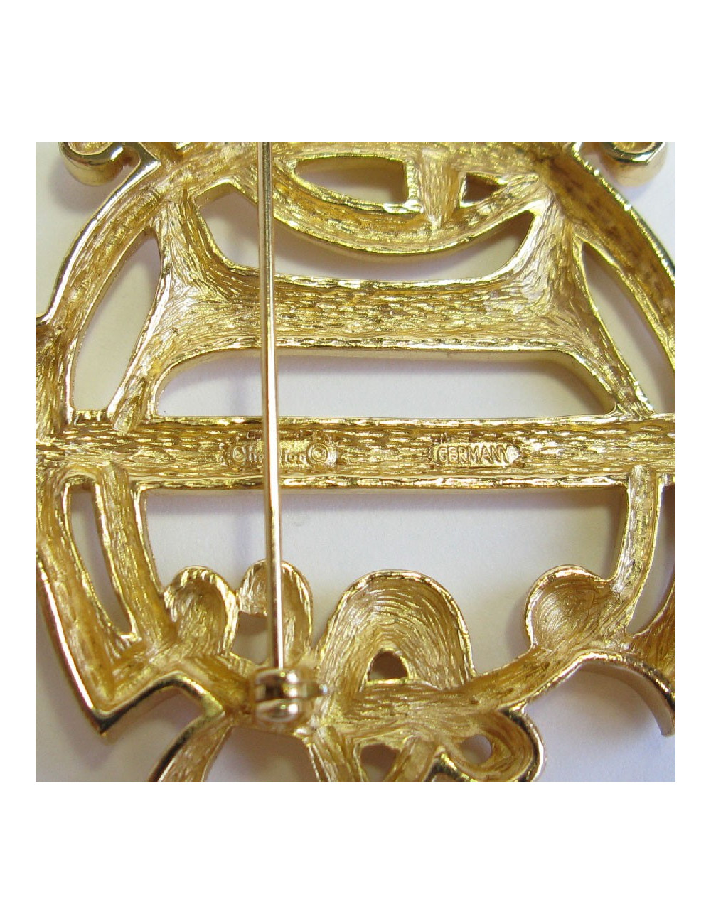 ES Broche DIOR Vintage en métal doré