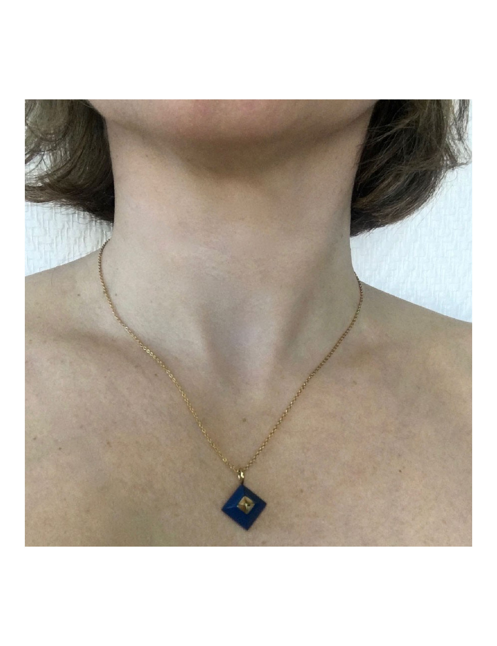 Collier HERMES en or avec pendentif Médor en lapis lazuli