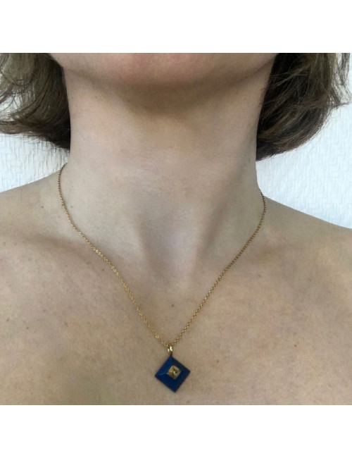 Collier HERMES en or avec pendentif Médor en lapis lazuli