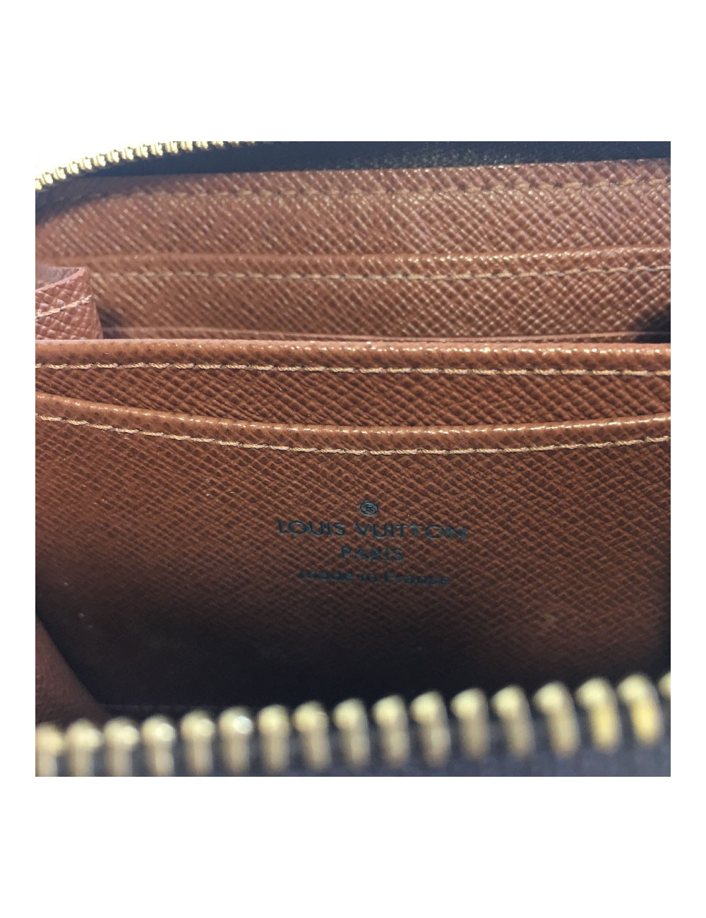  LOUIS VUITTON "Zippy" wallet in brown monogram canvas