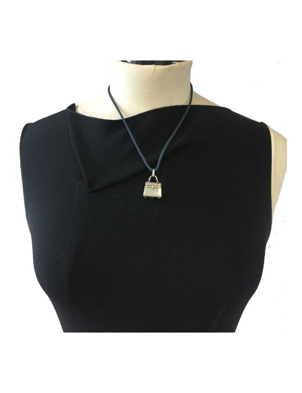 Collier cordon HERMES avec pendentif sac Kelly en argent