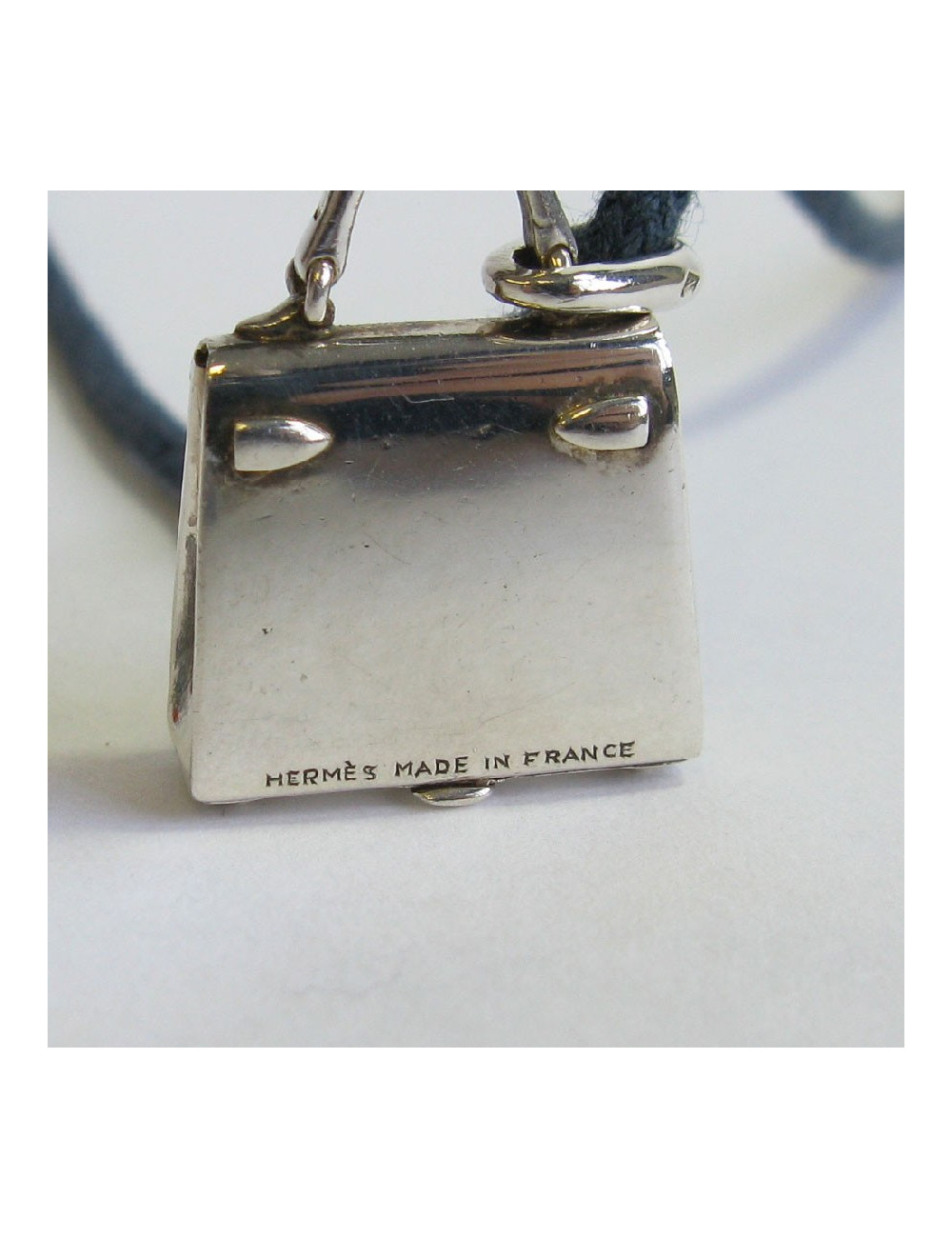 HERMES  'Kelly bag' amulet pendant in sterling silver