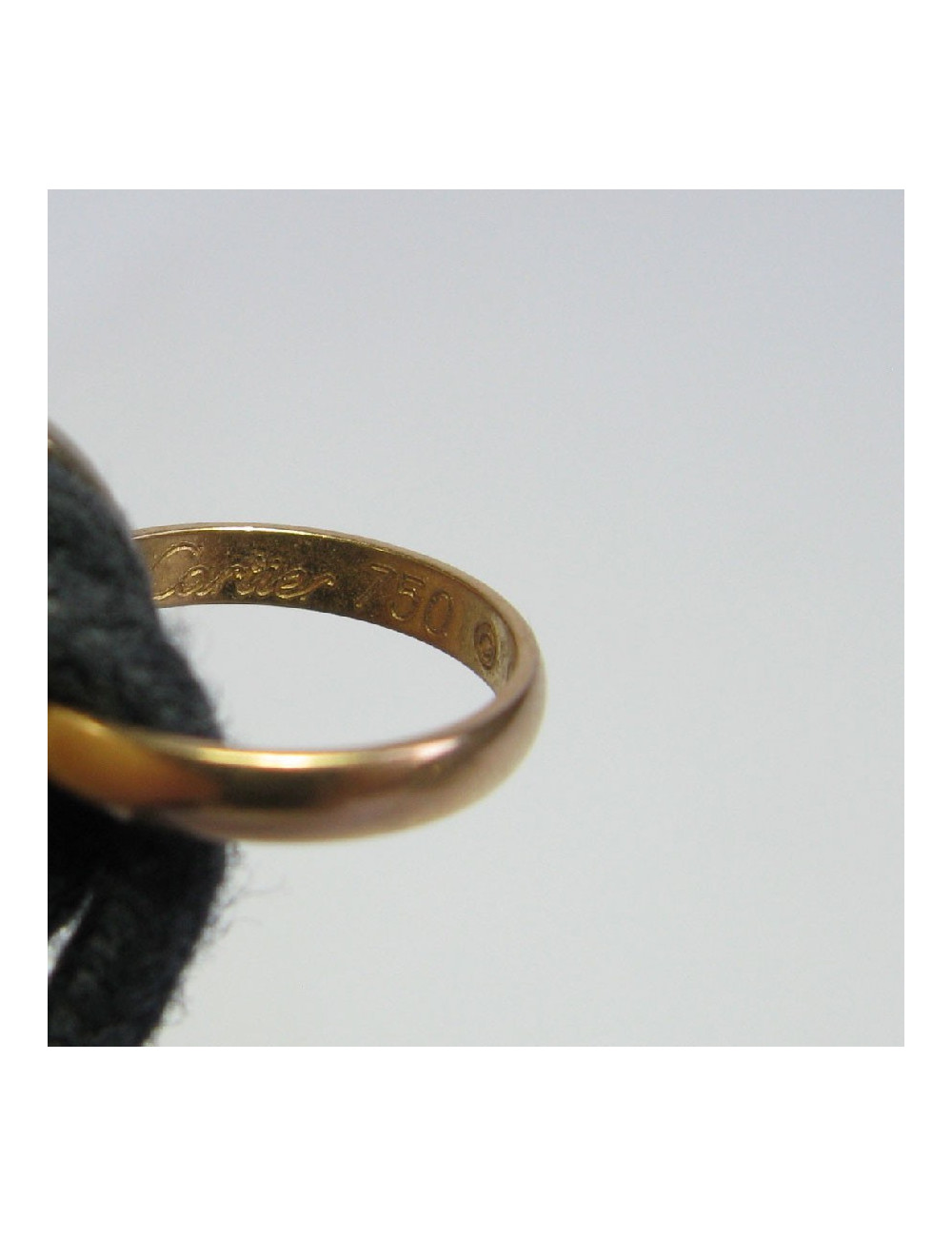 Bracelet CARTIER 'Trinity' cordon et anneaux 3 ors