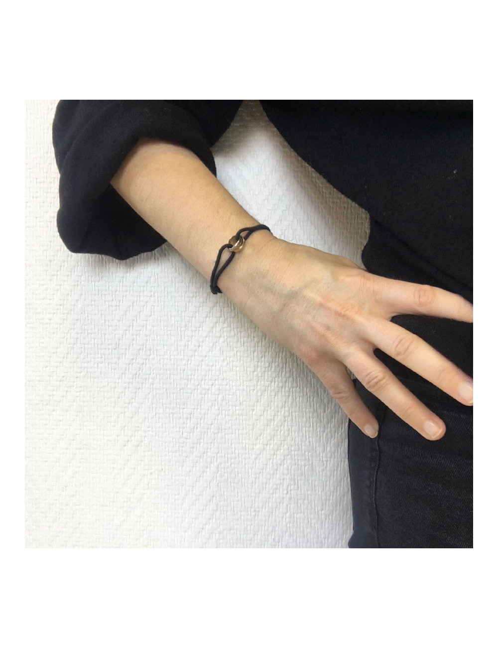 Bracelet CARTIER 'Trinity' cordon et anneaux 3 ors