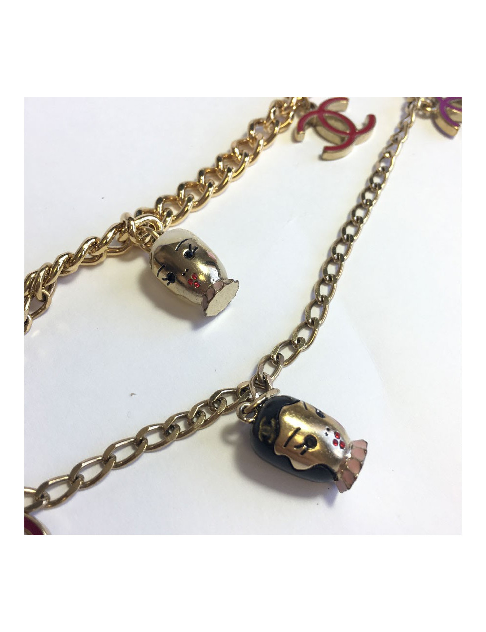 CHANEL "Paris-Shanghai"long necklace belt in gilt metal and charms