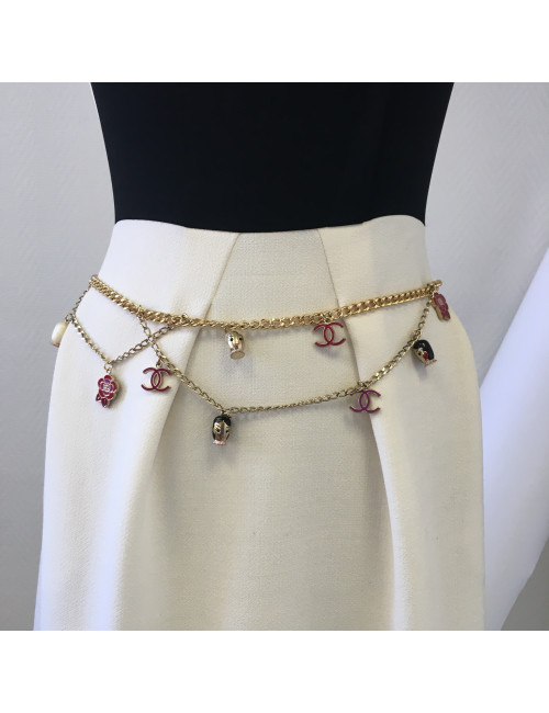 CHANEL "Paris-Shanghai"long necklace belt in gilt metal and charms