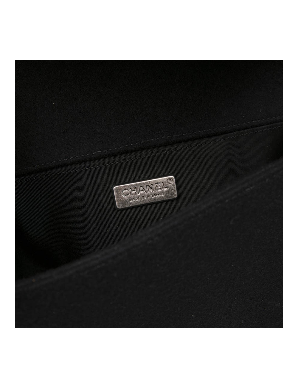 CHANEL Boy bag in black boiled wool with embroidered patches