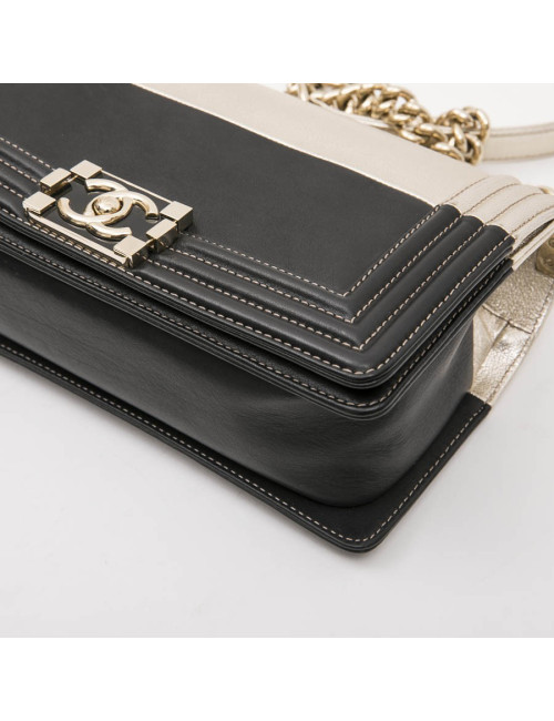 CHANEL Boy bag in black and pale gold smooth lamb leather