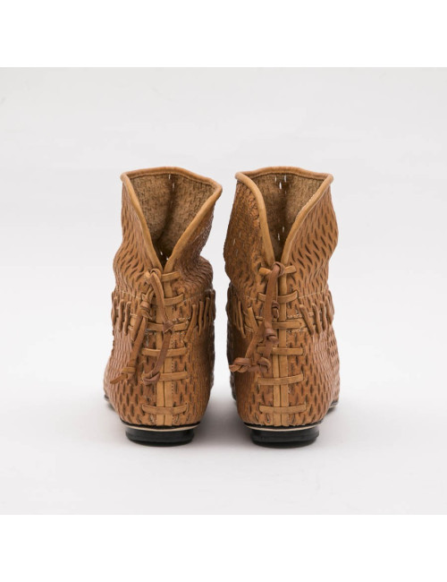 CHANEL Boots in Gold perforated leather and black lamskin leather size 37