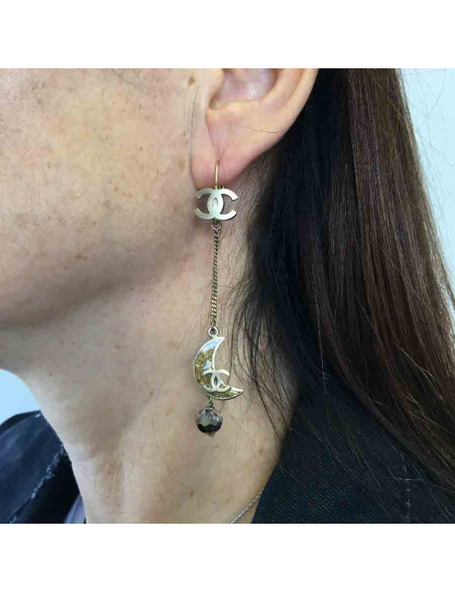 Boucles d'oreille clous CHANEL pendantes étoile et lune en métal doré