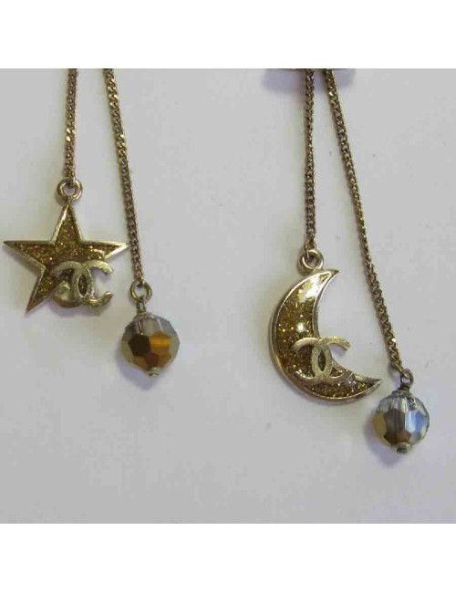 Boucles d'oreille clous CHANEL pendantes étoile et lune en métal doré