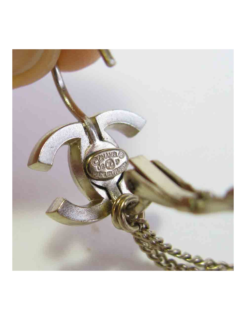 Boucles d'oreille clous CHANEL pendantes étoile et lune en métal doré