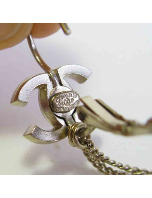 Boucles d'oreille clous CHANEL pendantes étoile et lune en métal doré