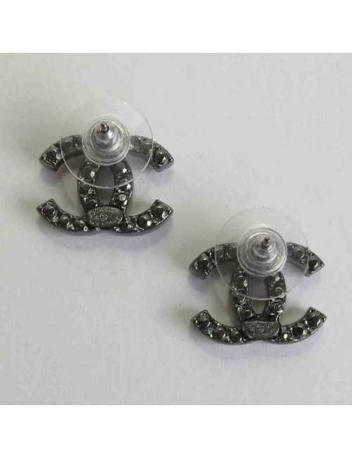CHANEL "CC" stud earrings in ruthénium and rhinestones
