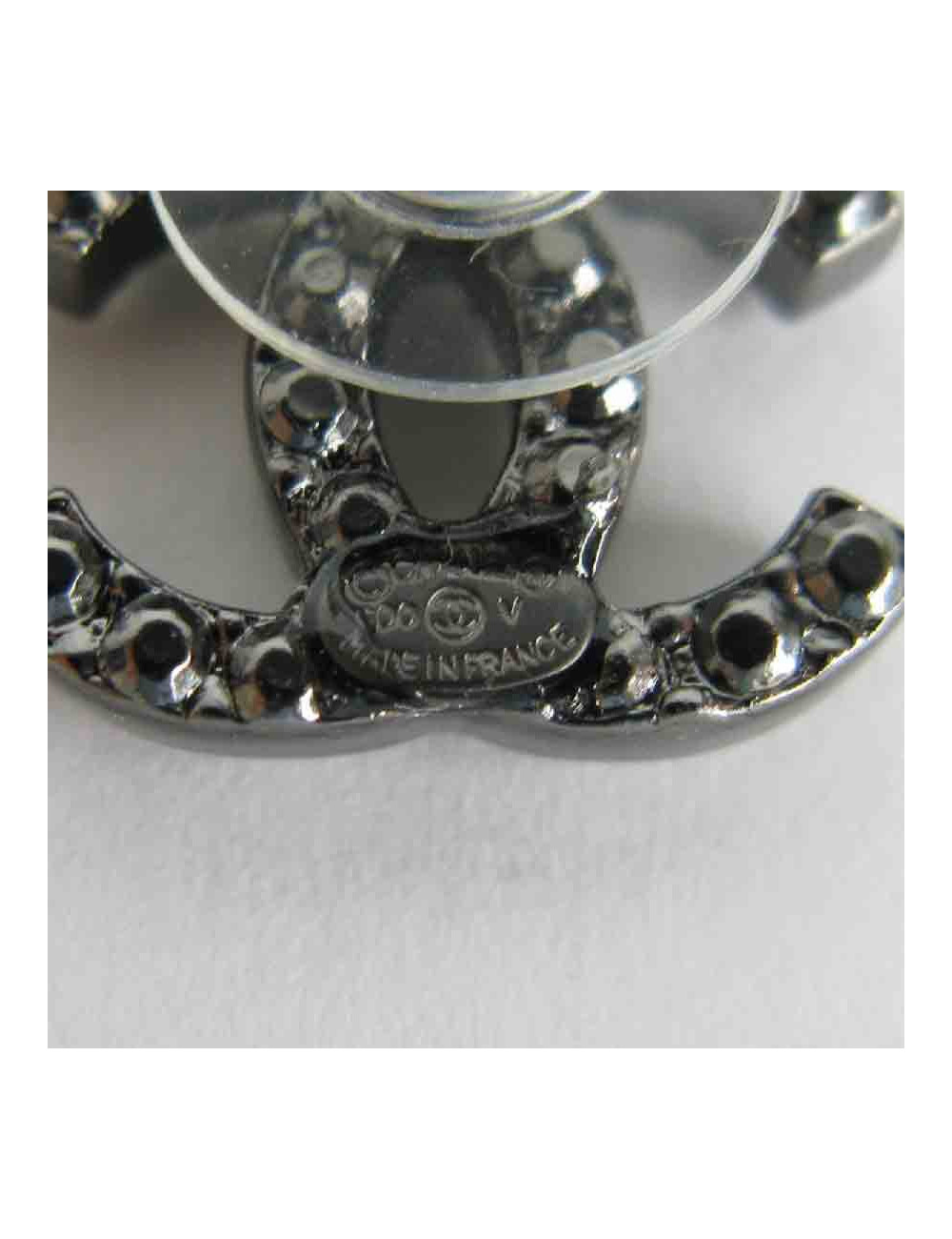 CHANEL "CC" stud earrings in ruthénium and rhinestones