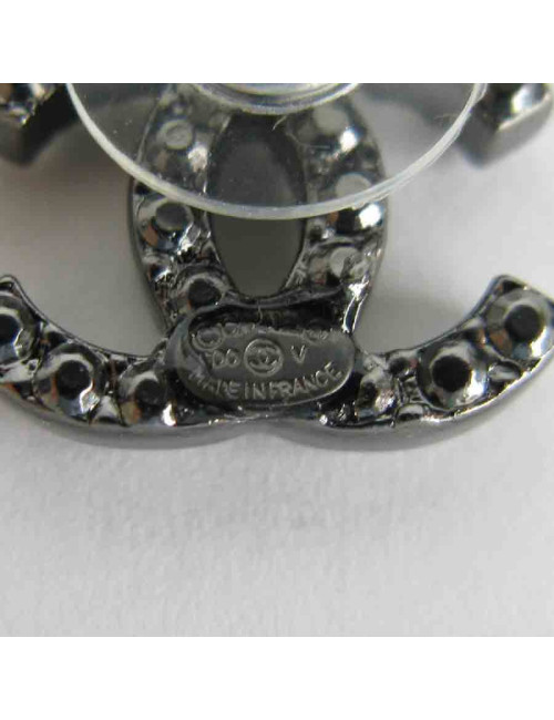 CHANEL "CC" stud earrings in ruthénium and rhinestones