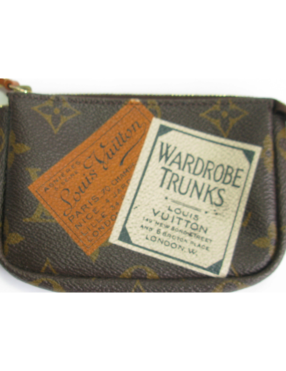 LOUIS VUITTON Wardrobe Trunks mini pouch in brown monogram canvas
