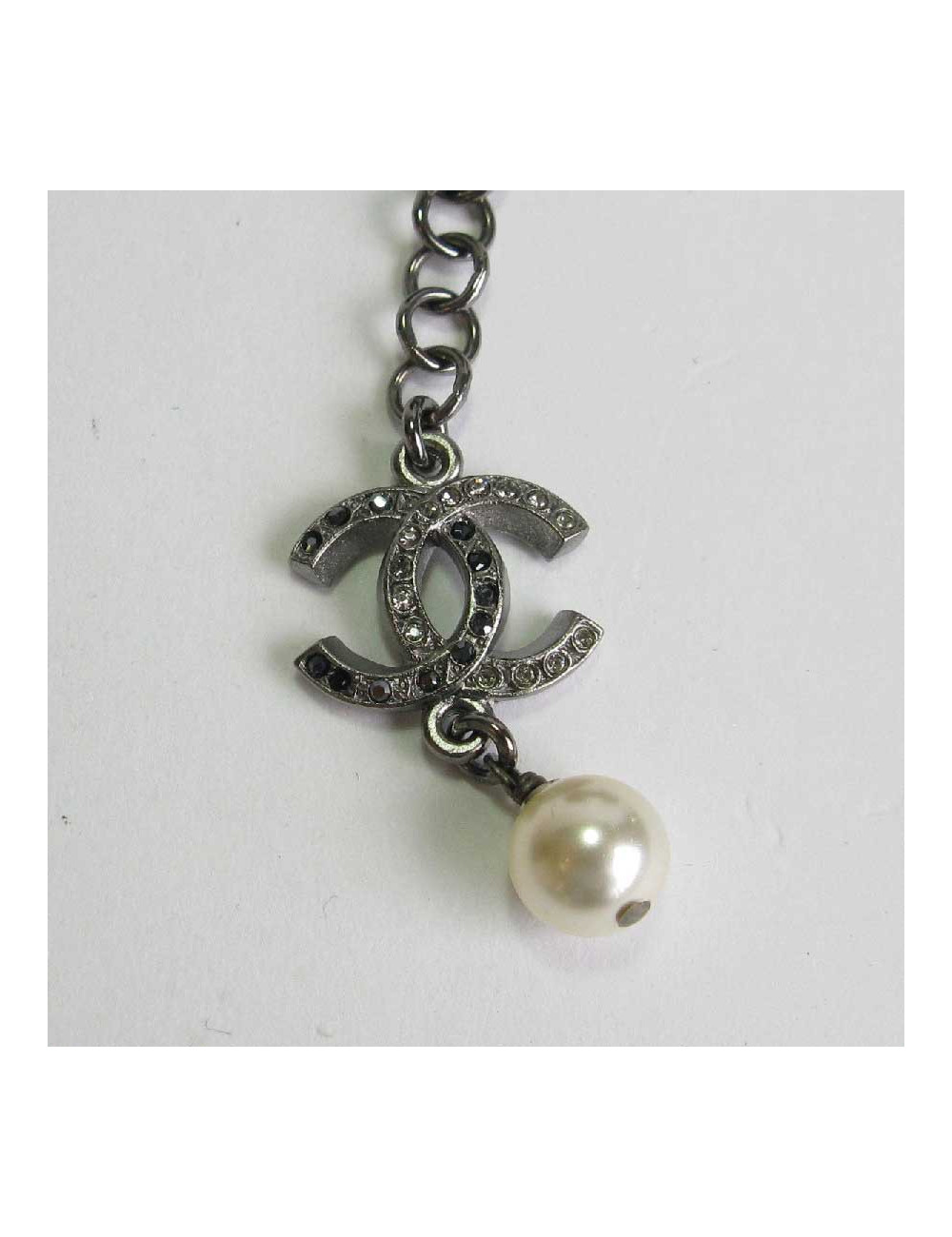 Collier ras de cou CHANEL noeud strass en métal argenté