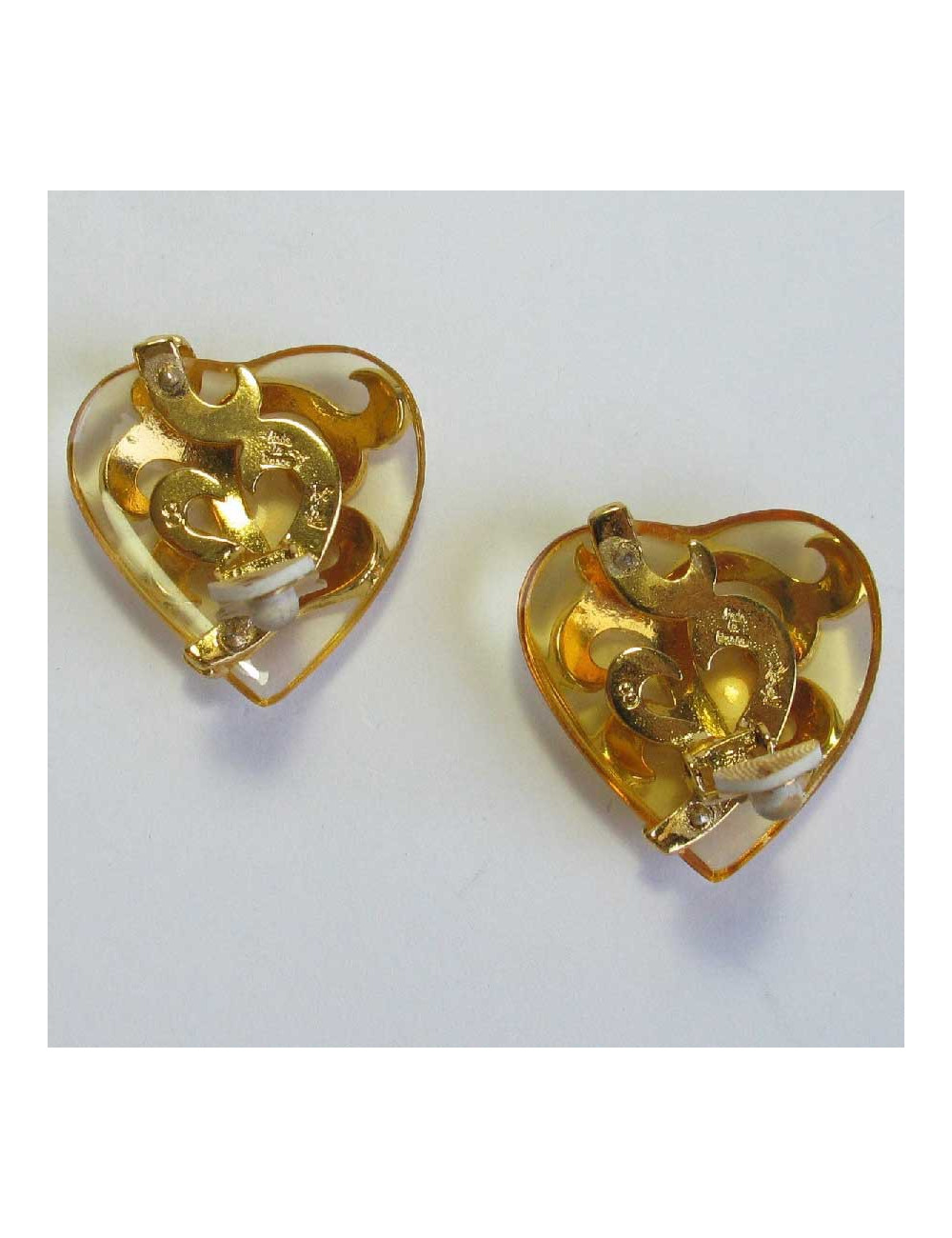 Boucles d'oreille clips coeur YSL YVES SAINT LAURENT dorées et transparentes