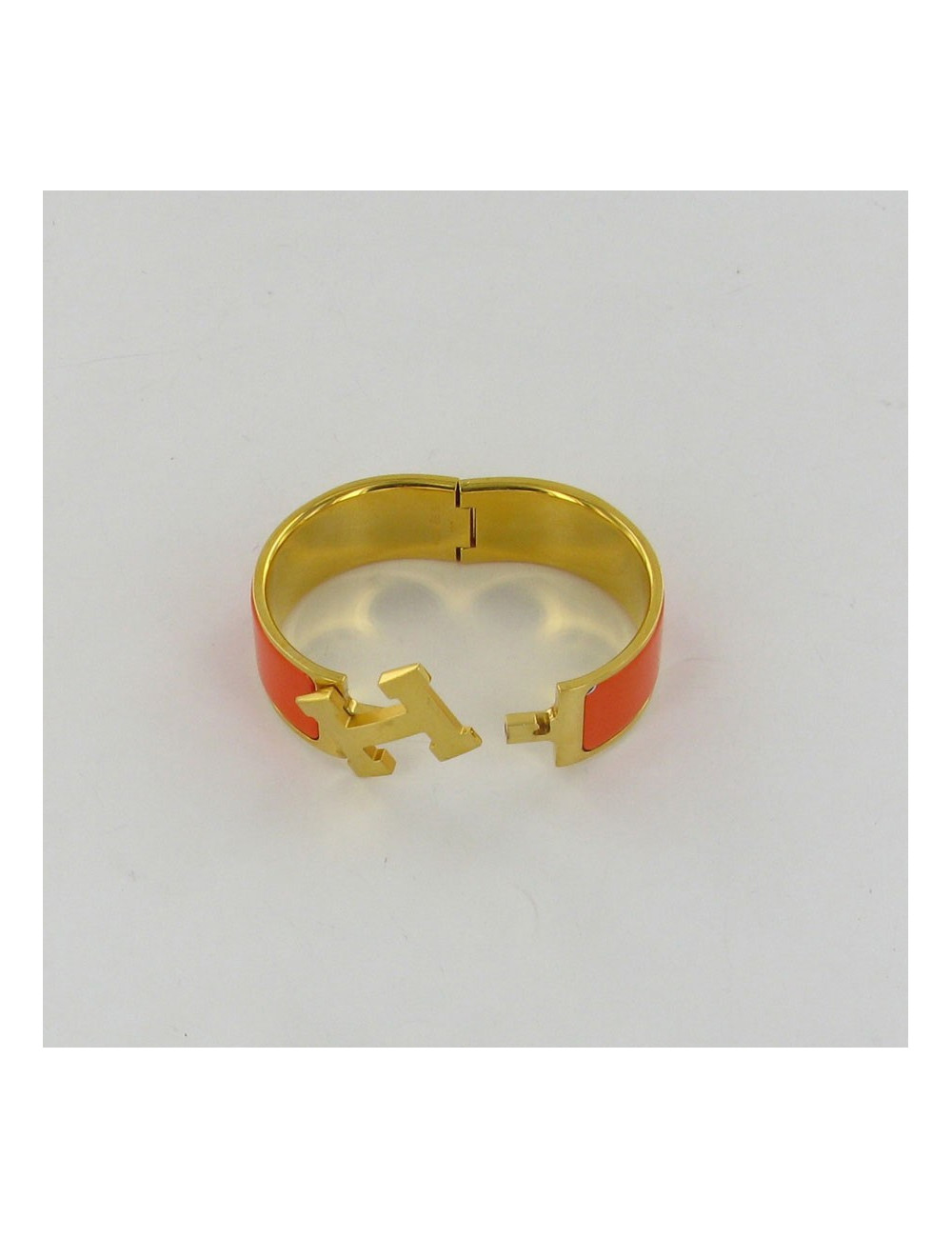 Bracelet "Constance"  HERMES émail orange H et doré