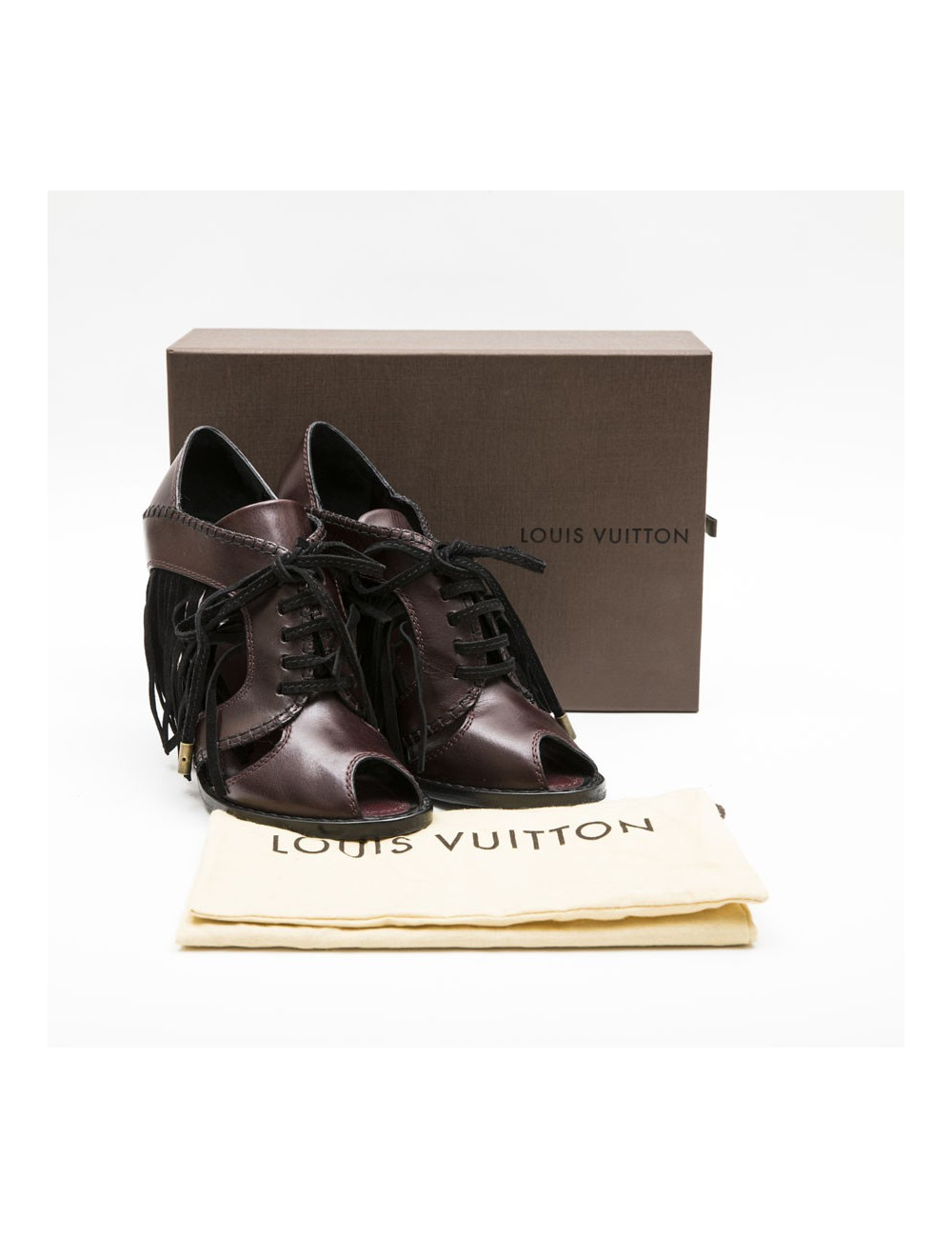 Sandales Hautes T 39 LOUIS VUITTON en cuir prune et franges noires